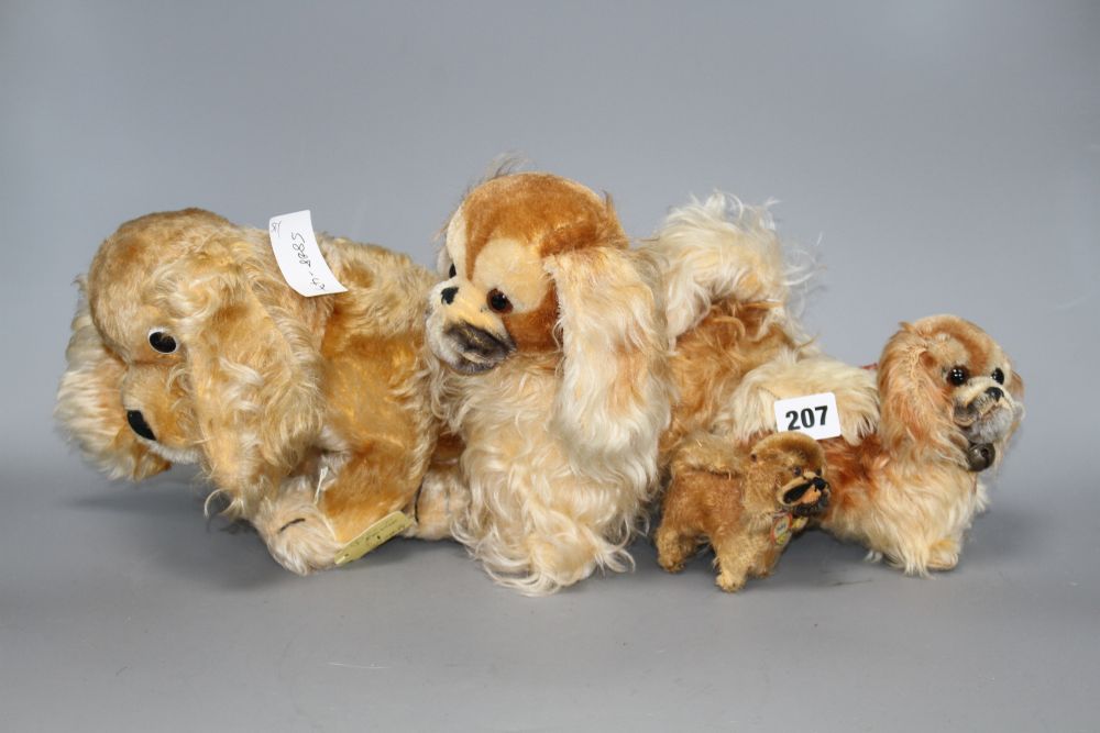 Three 1950s Steiff Peky dogs and a 1960s Revue Spaniel